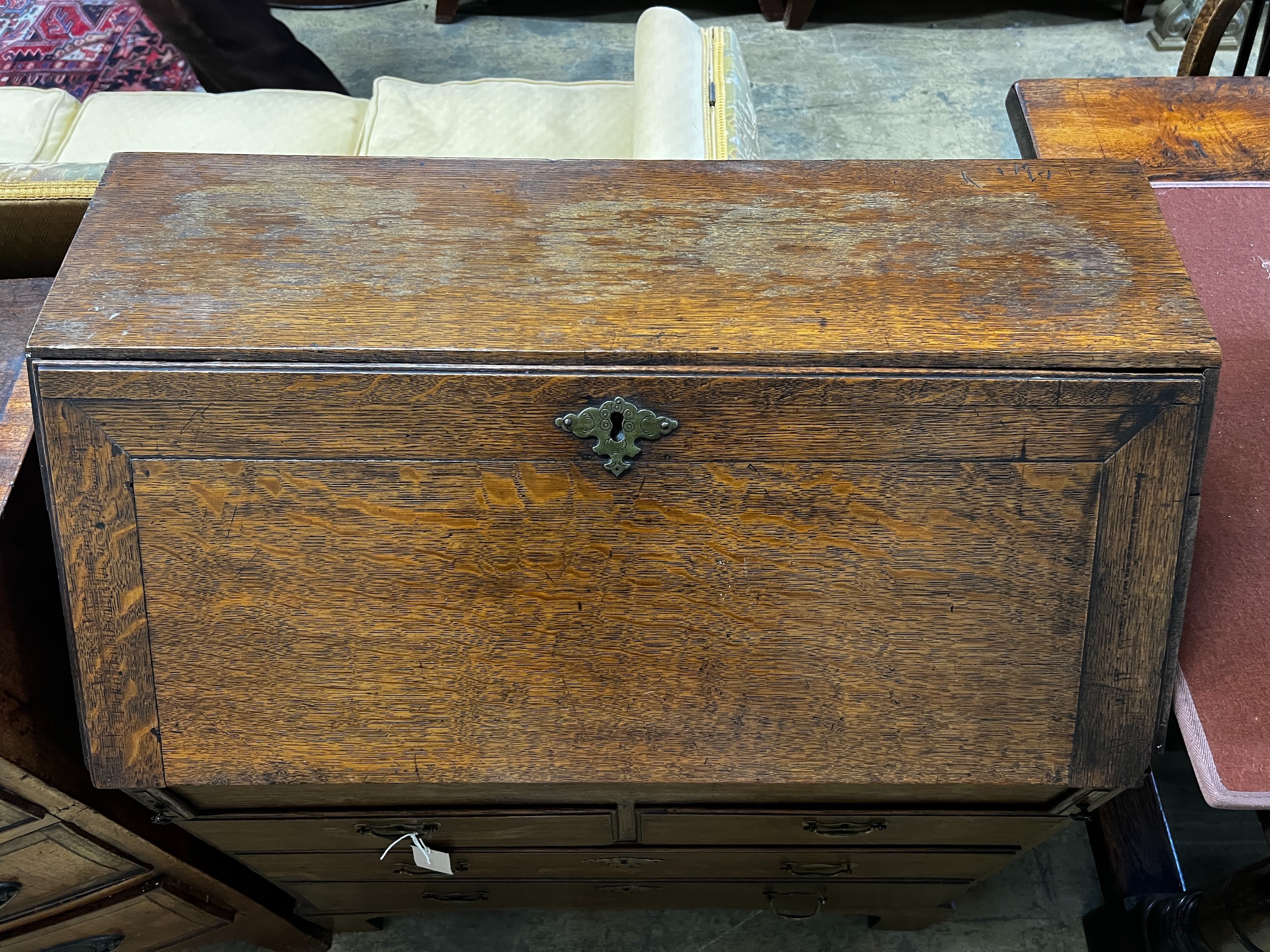 A small 18th century oak bureau, width 76cm, depth 40cm, height 94cm